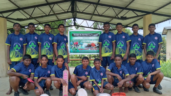 tudents receiving sports equipment from Vanni Hope, Distribution of volleyballs, netballs, cricket bat, and table tennis set, Under-16 team wearing new sports T-shirts, Under-17 team wearing new sports shorts, Teachers and Principal with donated sports equipment, Students practicing sports with new equipment, Children participating in school sports activities, Rural school students engaging in physical education, Donated sports equipment supporting youth wellbeing, Students and teachers enjoying outdoor sports in school, Empowering youth through sports and physical fitness initiatives
