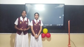 students using smart board in rural Sri Lanka classroom, digital learning in Kandy district school, Vanni Hope education project, classroom technology for rural students, teachers receiving smart board training, modern education tools in Sri Lankan schools, promoting quality education in rural areas, interactive classroom learning environment, empowering students through digital education, Smart Classroom initiative supported by VINVA Foundation