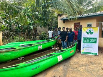 Inland fishing families in Trincomalee receiving fishing nets and canoes to restore livelihoods through a Vanni Hope community development project
