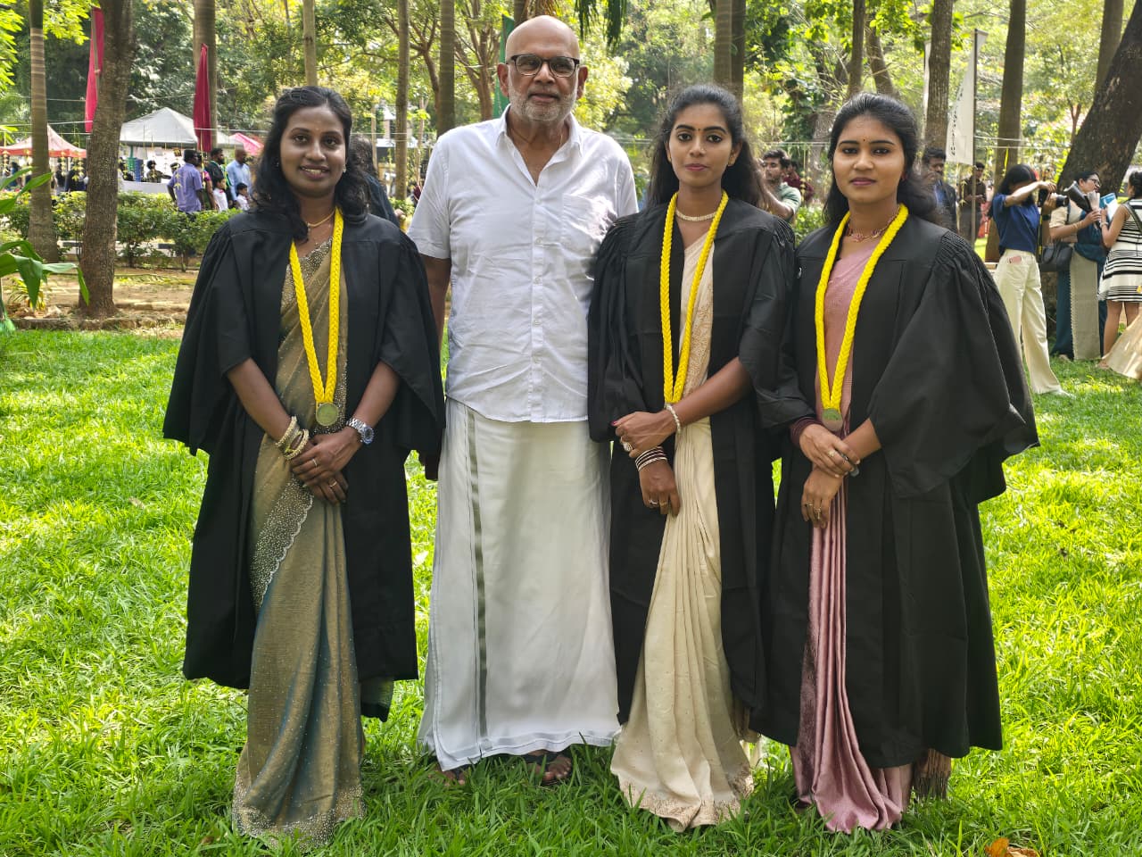 Sponsored law graduates Thevapriya Denishka and Rashika at University of Jaffna convocation with Mr Ranjan Sivagnanasundaram