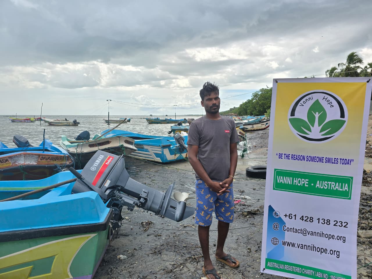 fishing motor handover, fisherman family Sri Lanka, Poonagari livelihood support, Kilinochchi fishing project, Yamaha outboard engine, Vanni Hope livelihood project, rural fisherman assistance, family livelihood development, fishing community support, humanitarian project Sri Lanka